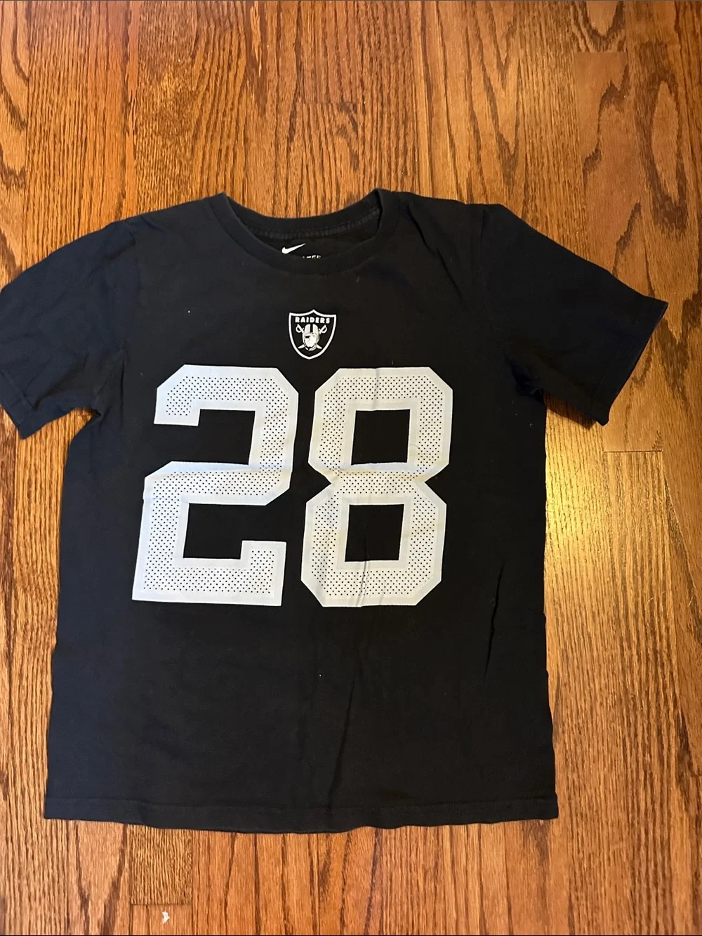 Nike Kids raiders Black Tee with Silver 28 and Small Shield